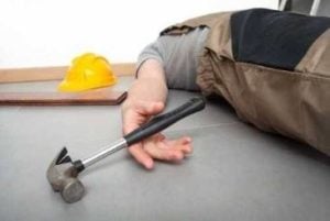 injured carpenter on the ground