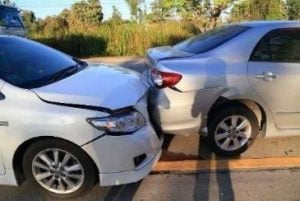 two silver cars involved in a car accident